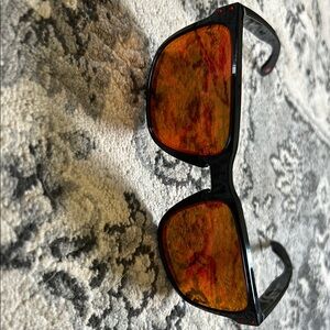 Oakley Stylish Black Sunglasses with Orange Lenses. Never worn.